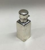 A Victorian silver scent bottle with hinged lid. B