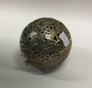 A Chinese pierced tea infuser. Est. £50 - £80.