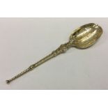 A chased silver gilt anointing spoon. Birmingham 1