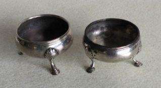 A pair of early Georgian silver circular salts. Lo