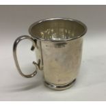 A silver christening mug. Birmingham 1931. Approx.