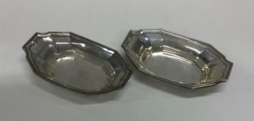 A pair of silver dishes. Marked Sterling. Approx.