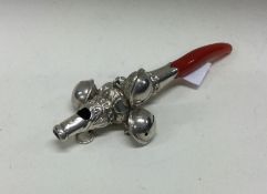 An early silver rattle. Apparently unmarked. Circa