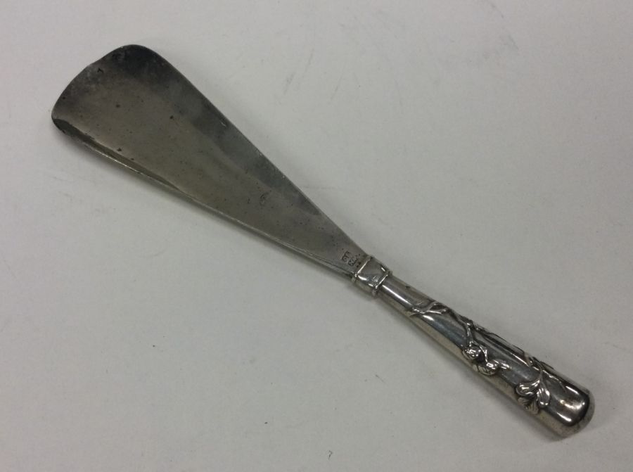 WANG HING: A rare Chinese silver shoe horn. Approx