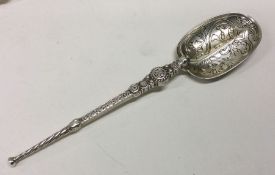 A chased silver anointing spoon. Birmingham 1910.