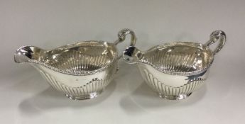 A good pair of Georgian silver sauce boats with ha