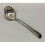 A George III silver sauce ladle. London. By George