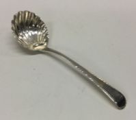 A George III silver sauce ladle. London. By George