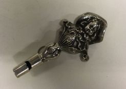 A heavy novelty silver rattle / whistle. Birmingha