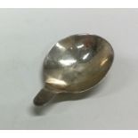 A silver caddy spoon with bright cut handle, possi