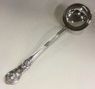 A heavy Kings pattern silver soup ladle. London 18