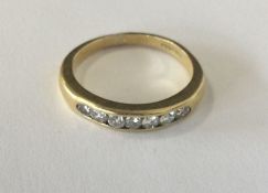 A good diamond ring of rectangular form in 18 cara