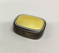 A silver and yellow enamel box. By Marius Hammer.