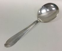 A silver spoon of Georg Jensen style. Approx. 51 g