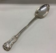 A large Victorian silver serving spoon. London 185