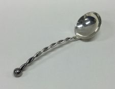 A stylish silver ladle with spiral decoration. Mar
