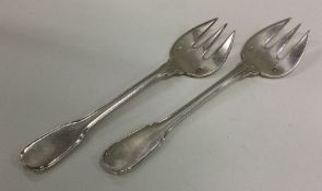 EMILE PUIFOCAT: A rare pair of silver pastry forks