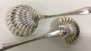 An 18th Century pair of feather edged silver sauce