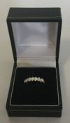 A good seven stone diamond ring. Approx. 35 pts in