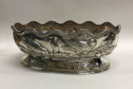 A fine Victorian silver bowl chased with birds. Lo