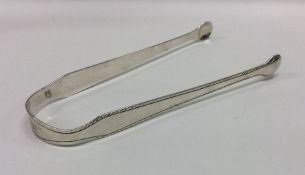 An 18th Century pair of silver ice / sugar tongs.