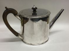 A George III silver teapot. London 1789. By Henry