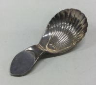 A George III silver caddy spoon. Sheffield 1786. B