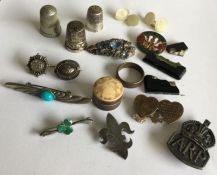 A group of silver and other thimbles etc. Est. £20