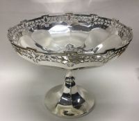 A stylish heavy silver pierced sweet dish of shape