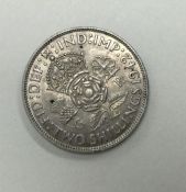 A George V 2 Shilling dated 1942.