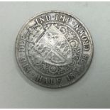 A Queen Victoria Half Crown dated 1893.