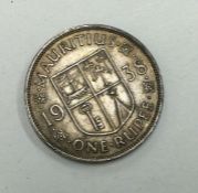 A Mauritius 1 Rupee dated 1938.
