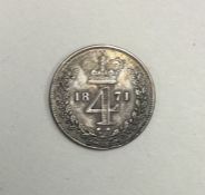A Queen Victoria 4 pence dated 1871.