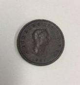 A George III Halfpenny dated 1807.