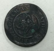 A Crown Copper Company 1 penny token dated 1811.