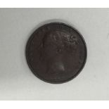 A Queen Victoria Farthing dated 1853.