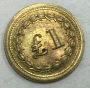 A Royal Arsenal Cooperative £1 token.