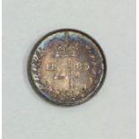 A Queen Victoria 4 pence dated 1885.