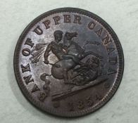 A bank token for Upper Canada dated 1854.