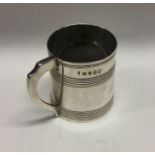 A George III silver mug of reeded design. London 1