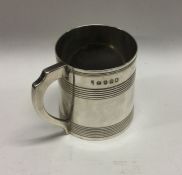 A George III silver mug of reeded design. London 1