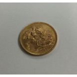 A 1963 full sovereign. Est. £300 - £350.