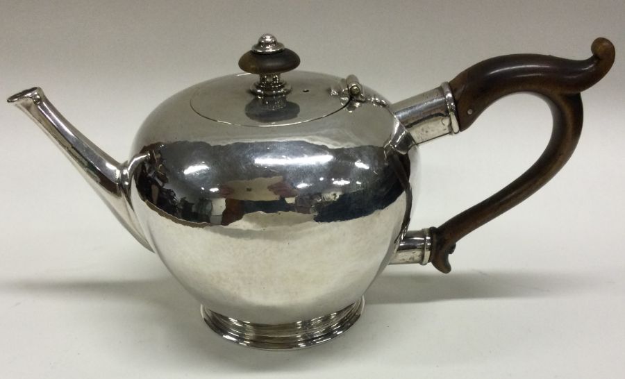 A fine quality George I silver bullet shaped teapo