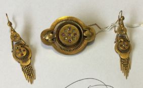 A good pair of Victorian gold earrings with tass