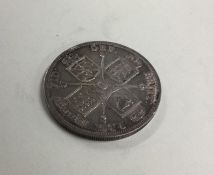 An 1887 Crown (coin). Est. £15 - £20.