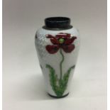 An attractive silver and enamelled vase with flora