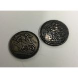 Two silver Crowns (coins). Est. £20 - £30.