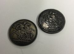 Two silver Crowns (coins). Est. £20 - £30.