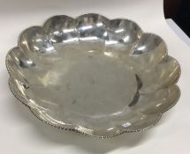 A large oversized 18th Century silver dish. Approx