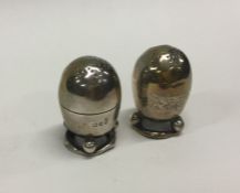 A pair of heavy silver peppers. London. Approx. 53